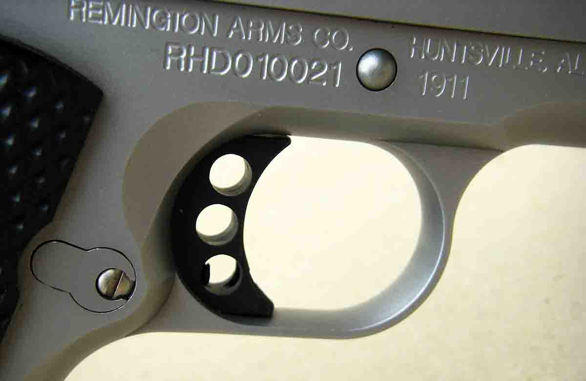The lightweight aluminum trigger is extended, drilled with three holes and features an overtravel stop screw.